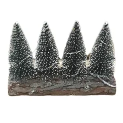 4 sapins sur pied en bois avec l