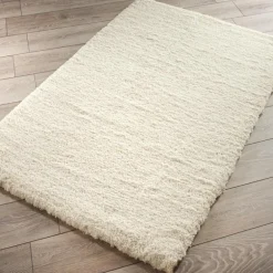 Tapis teddy creme